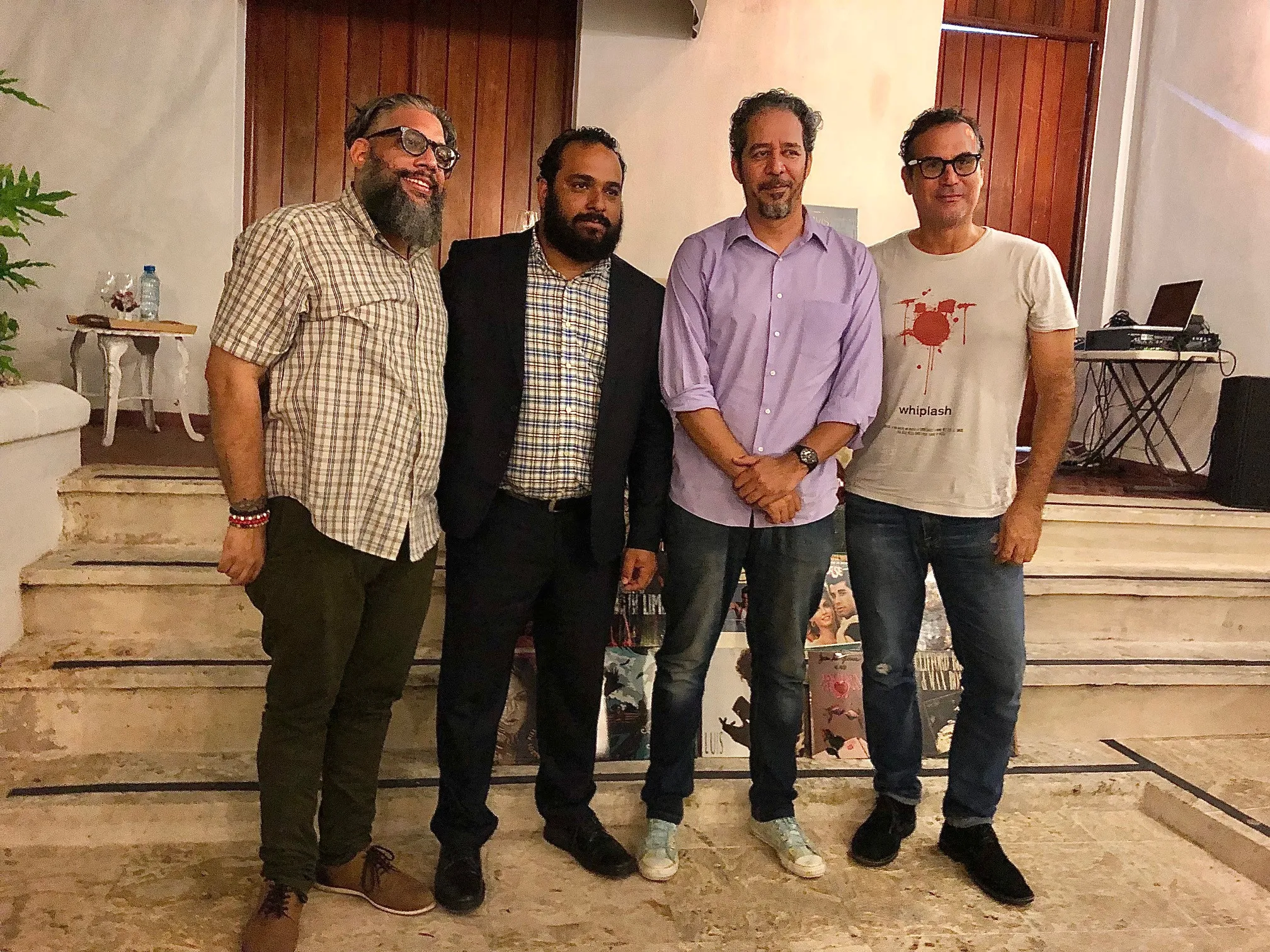 El escritor Luis Reynaldo Pérez, Mijail Peralta, gerente de Cultura Banreservas; el investigador musical Manuel Betances, y el escritor Miguel Yarull.